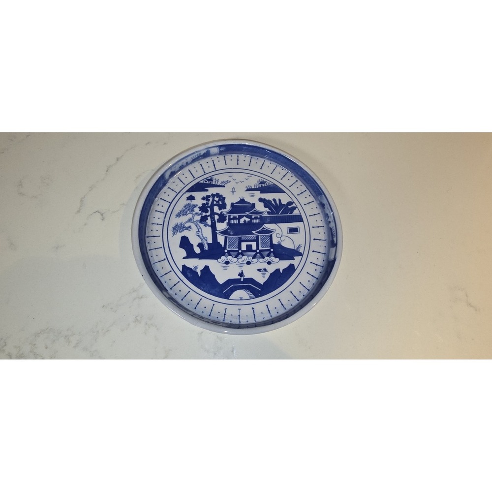 Chinese Export plate features a traditional blue and white Canton scenery...
